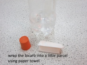 The bicarb is wrapped in paper towel to produce a small pellet